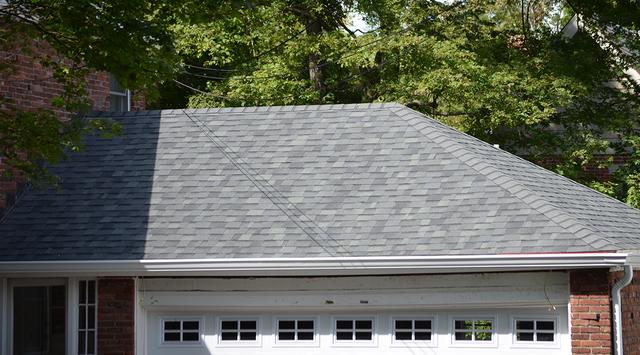 A garage roof before work was completed by O'lyn Roofing