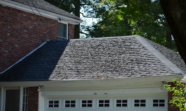 A garage roof after work was completed by O'lyn Roofing