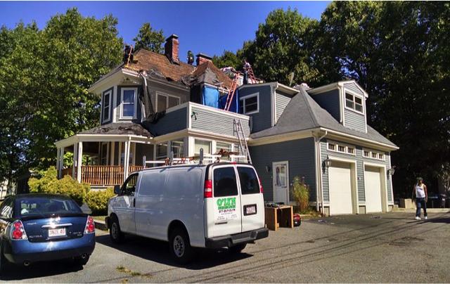 O'lyn Roofing on site in Hyde Park, performing a roof replacement.