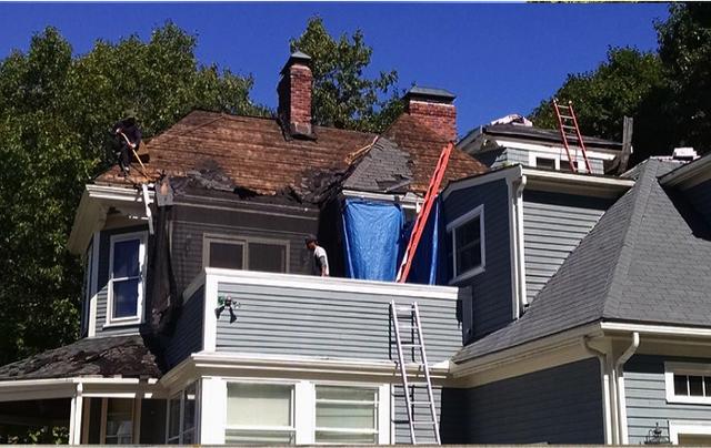 O'lyn Roofing continues to strip and repair roof in Hyde Park, MA