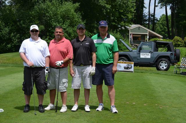 The O'lyn Roofing team at the 2014 Tom Olen Memorial Golf Outing.