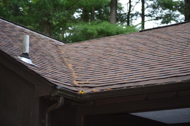 A roof in Canton after O'lyn crews removed debris from the roof and gutters.