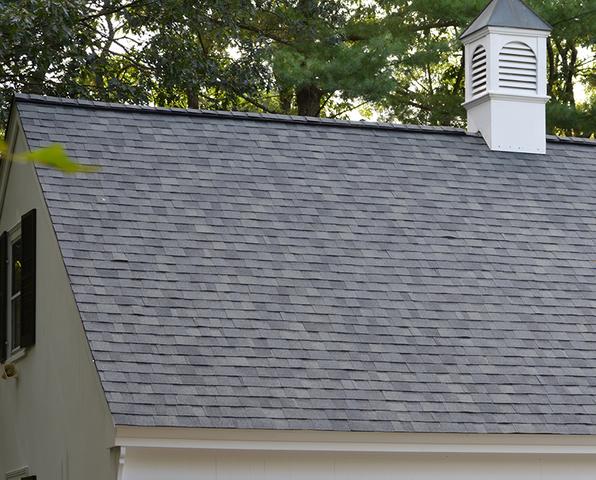A home in Wellesley after after O'lyn Roofing crews installed new architectural shingles.