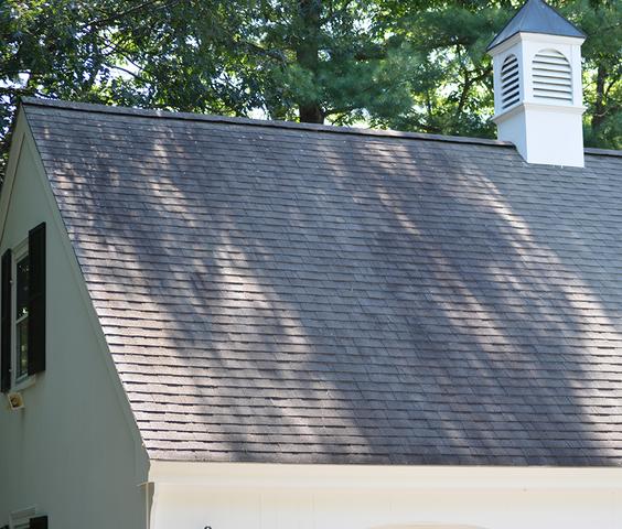An old worn out asphalt shingle roof before being replaced by O'lyn Roofing crews.