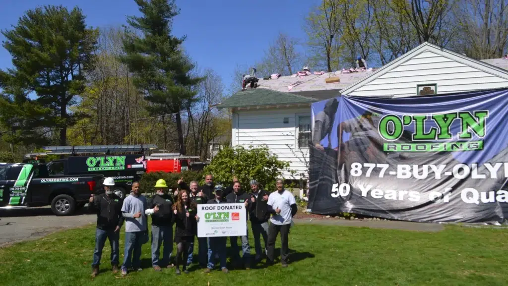 Olyn Roofing Crew at Weston Scout House for a roof donation