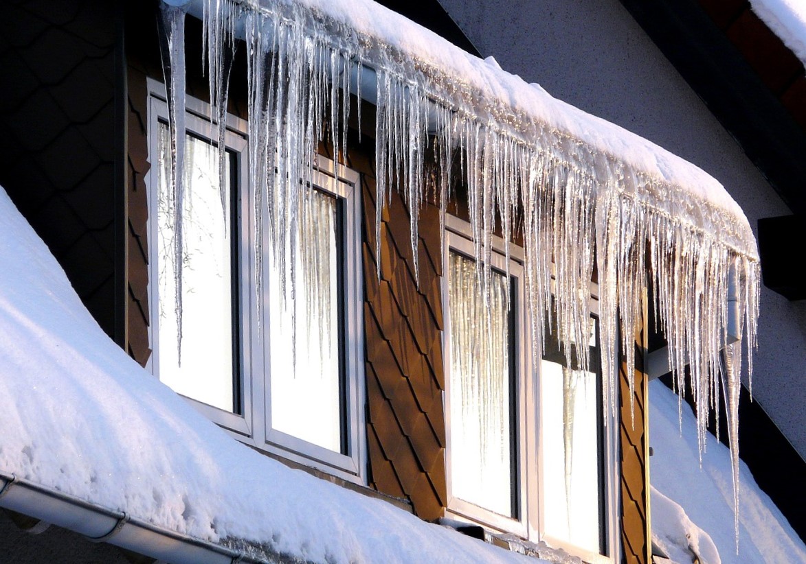 How Gutter Guards Help Prevent Ice Dams & Roof Damage in Greater Boston Winters