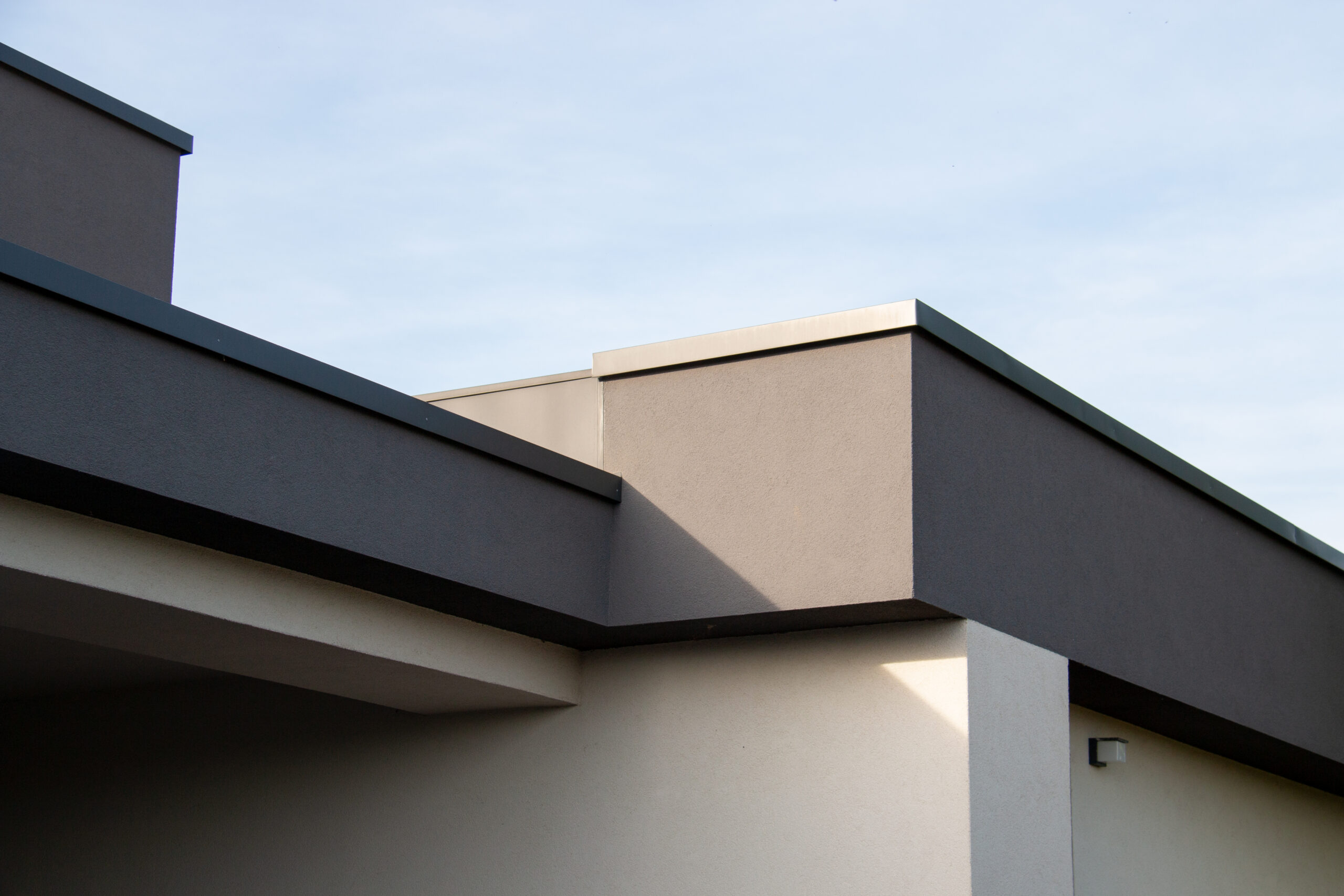 Flat Roof Cooling: The Rise of Reflective Membranes for MetroWest Modern Homes