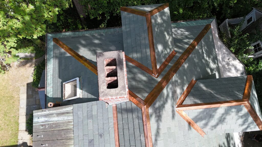 Slate roof with copper vallyes and ridges in Cambridge MA